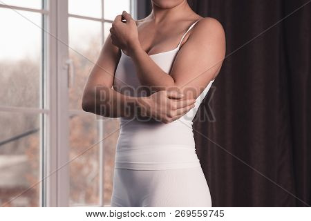 Woman With Pain In Elbow, Joint Inflammation At Home