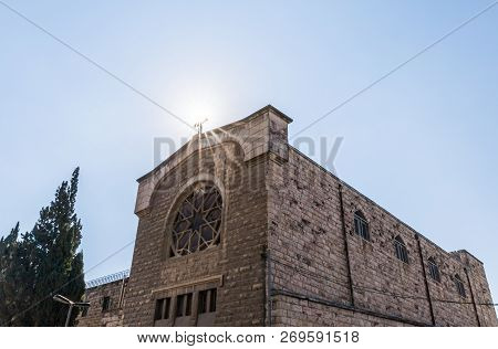Jerusalem, Israel, November 17, 2018 : The Sun Illuminates The Holy Cross At A Christian Monastery L
