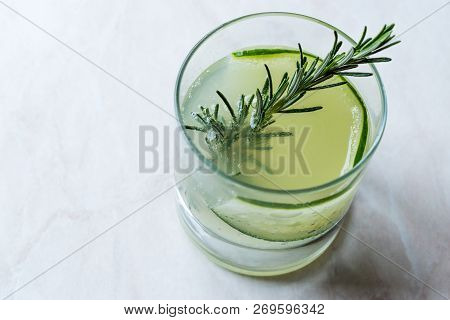 Rosemary Gin Gimlet Cocktail With Cucumber Slice.