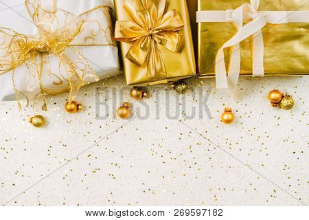 Topv View Of Golden Christmas Gift Boxes