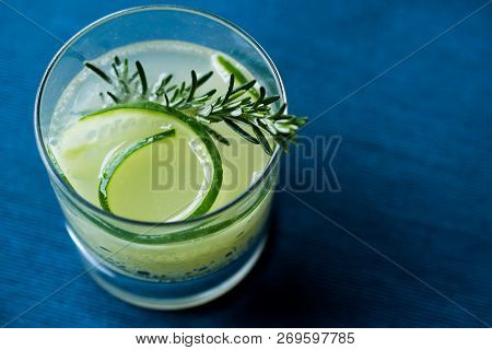 Rosemary Gin Gimlet Cocktail With Cucumber Slice.