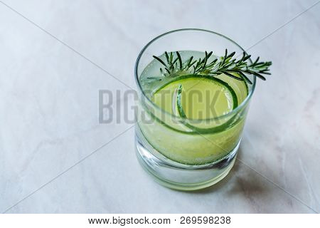 Rosemary Gin Gimlet Cocktail With Cucumber Slice.