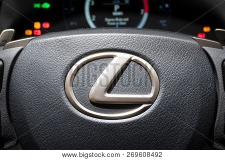Paris - Oct 3, 2018: Lexus Logo On The Steering Wheel Of A Modern Lexus Car At The Paris Motor Show.