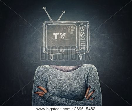 Surreal Young Addicted Woman With Crossed Arms And Tv Icon Sketch Instead Of Head Over Blackboard Ba