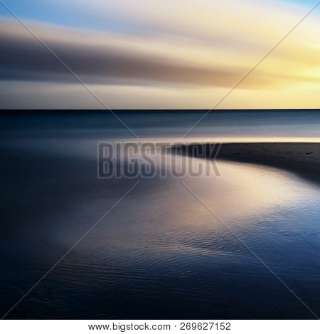 The Baltic Sea Coast In Sassnitz On The Island Ruegen During Cloudy Sunrise, Northern Germany.