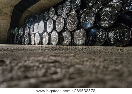 Radioactive Waste Package Barrels In Underground Repository, Terrorism Pollution Apocalypse Concept