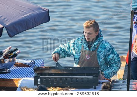 Prague, Czech Republic - November 17, 2018: Man Prepares Foood At The Popular Farmers Market At The 