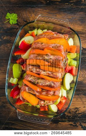 Raw Pork Fillet Marinated With Pepper, Salt, Fresh Parsley, Honey, Paprika, Cumin. Meat,  Persimmon,