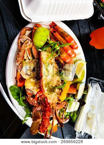 A Closeup Of A Plate With Delicios Crustacean