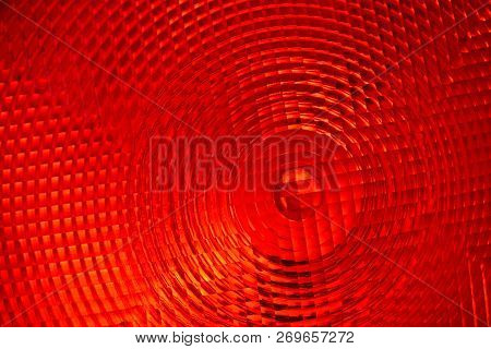 Abstract Background Of Red Faceted Plastic Reflective Surface Sign Or Rear Lamp Of Taillight