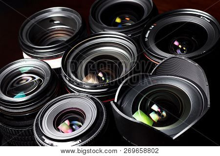 Set Of Various Dslr Lenses With Colorful Reflections