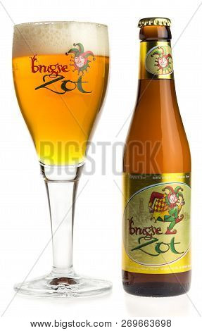 Groningen, Netherlands - November 16, 2018: Bottle And Glass Of Brugse Zot Beer Isolated On A White 