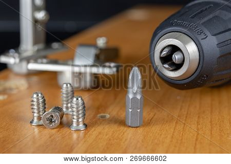 Installation Of Chipboard Furniture In A Carpentry Workshop. Accessories And Tools For Carpenters.
