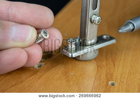 Installation Of Chipboard Furniture In A Carpentry Workshop. Accessories And Tools For Carpenters.