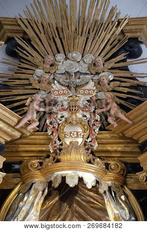 WURZBURG, GERMANY - JULY O4, 2018: Holy Spirit Bird, Virgin Mary altar in the Neumunster Collegiate Church in Wurzburg, Germany