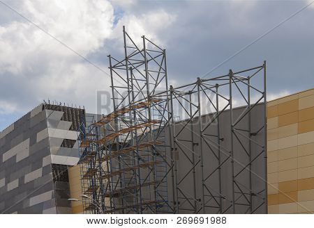 Concrete Construction, Unfinished Building And Blue Sky