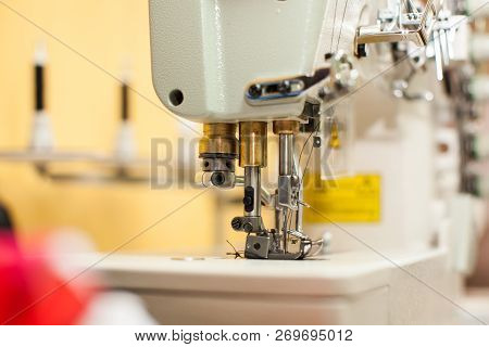 On The Cutting Table Lie Scissors, Thread And Pins. Work Place Of Seamstress. Topp View, Place For T