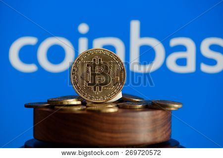 Tula, Russia - October 31, 2018: - Bitcoin Btc On Stack Of Cryptocurrencies With Coinbase Logo In Ba