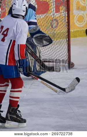 Ice Hockey Player Shoots And Scores Game,