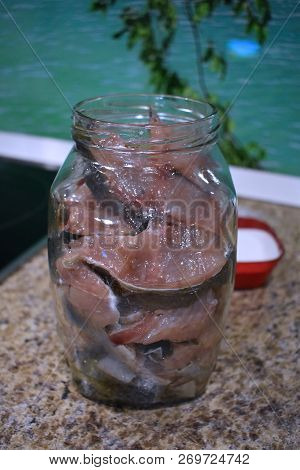 Salted Keta Fish Sliced ??in Oil In A Jar. 
Proper Nutrition.