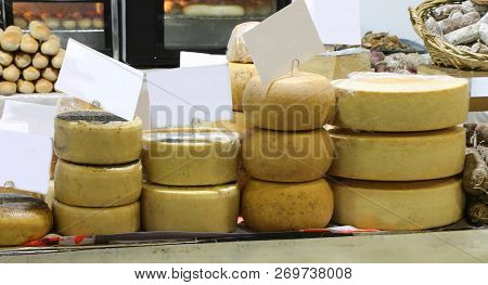 Many Aged Cheeses In The Stall Specializing In Dairy Products