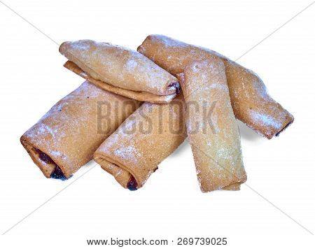 Cookies Rolled With Cherries And Black Currants Isolated On A Wh