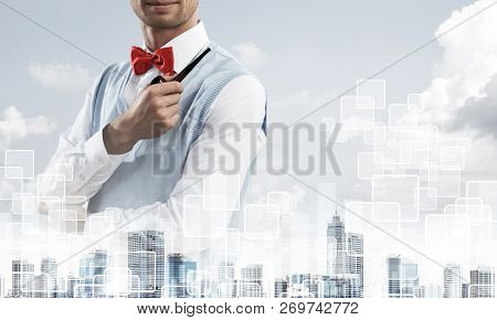 Double Exposure Of Confident And Young Businessman In Smart-casual Wear Smoking Pipe And Modern City