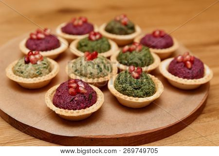 Pkhali appetizer, Georgian traditional dish, on wooden board