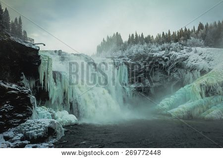 Biggest Frozen Swedish Waterfall Tannforsen In Winter Time