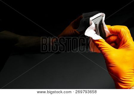 Car Polish Wax Worker Hands Polishing Car. Buffing And Polishing Vehicle. Car Detailing. Man Holds A