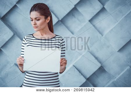 Beautiful Head Down Woman Carrying White Paper