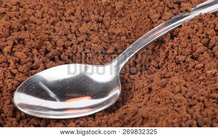 Image Of Many Of Milled Coffee And Teaspoon