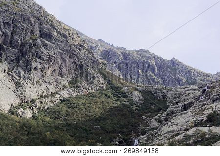 Mountains With Clouds In The Restonica Valley In Corsica