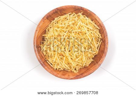 Potato Sticks In A Wooden Bowl. Batata Palha Isolated On White Background. Top View
