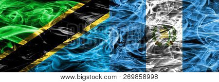 Tanzania Vs Guatemala, Guatemalan Smoke Flags Placed Side By Side. Thick Colored Silky Smoke Flags O