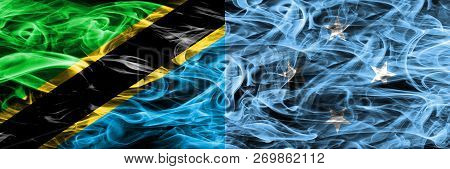 Tanzania Vs Micronesia, Micronesian Smoke Flags Placed Side By Side. Thick Colored Silky Smoke Flags