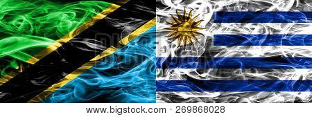 Tanzania Vs Uruguay, Uruguayan Smoke Flags Placed Side By Side. Thick Colored Silky Smoke Flags Of T