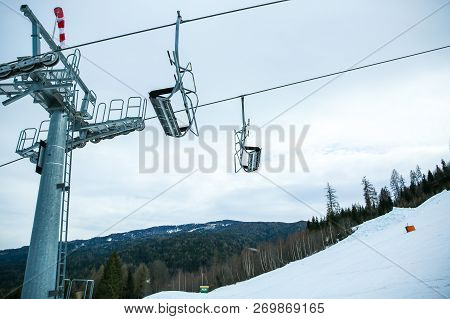 Winter Mountains Panorama With Ski Slopes And Ski Lifts. Alps. Austria.