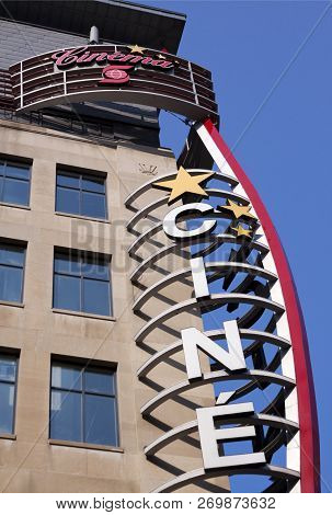 Montreal, Quebec, August 21, 2017 - Vertical Close Up Of A Giant Cinema Sign In Downtown Montreal