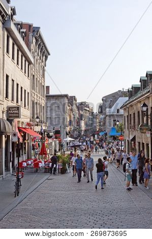 Montreal, Quebec, August 21, 2017 - Vertical View Of The Cobbled Streets, Filled With Tourists, In O
