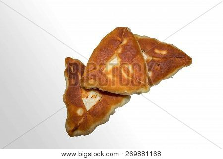 Triangular Russian Belyashi With Meat Isolated On White Background. Russian Fried Pies. Isolate.