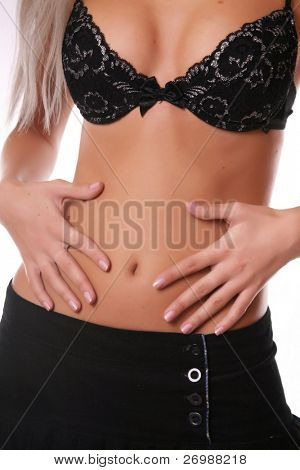 Girl holding hands on the stomach