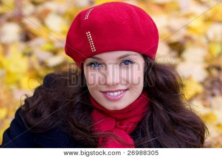 Girl with red roses in smiles