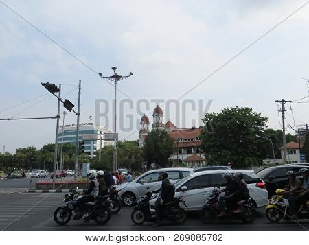 Semarang, Indonesia - October 29, 2018: Vehicles Stop At Red Traffic Light On Pandanaran Street With