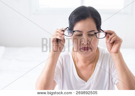 Elderly People Woman Suffering From Eye Pain Hand Holding Eyeglasses
