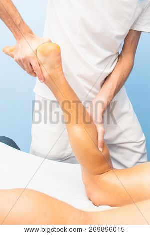 Physiotherapy Practice A Drain Massage In The Calf To An Athlete