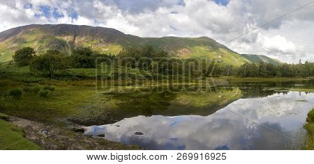Catbells And Maiden Moor Reflection In Derwent Water, Lake District, Cumbria, England