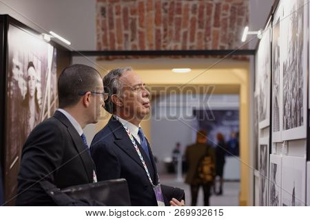 ST. PETERSBURG, RUSSIA - NOVEMBER 15, 2018: Pasquale Terracciano, Ambassador of Italy in Russia (center) on the opening of photo exhibition during Saint-Petersburg International Cultural Forum