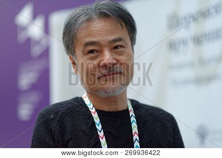 ST. PETERSBURG, RUSSIA - NOVEMBER 17, 2018: Kiyoshi Kurosawa, Japanese film director, scriptwriter, writer, professor talks with press during Saint-Petersburg International Cultural Forum