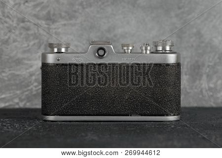 Moscow, Russia, February 06, 2018. The Old Film Camera Zarya, Brown Body, Released1961 On The Backgr